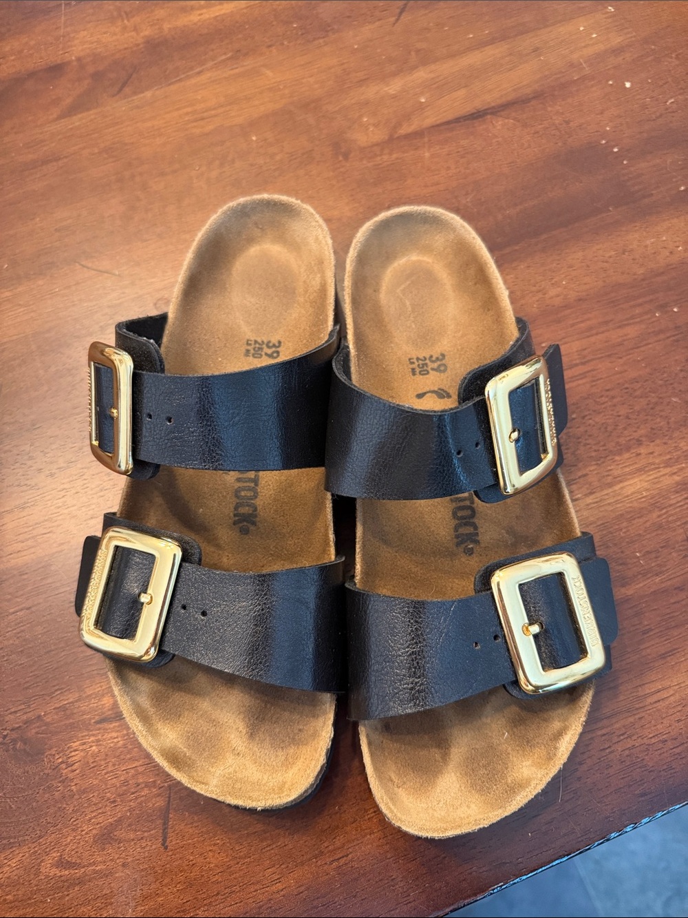 Birkenstock Sydney Black Leather Double-Buckle Sandals with Gold Buckles